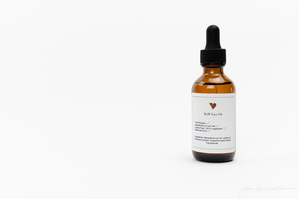 RAW Face Oil, Cold-Pressed, Ingredients you can eat, cruelty-free, 100% vegetarian, made with love. Ingredients: Macadamia nut oil, jojoba oil, rosemary extract, grapefruit seed extract, tocopherols.